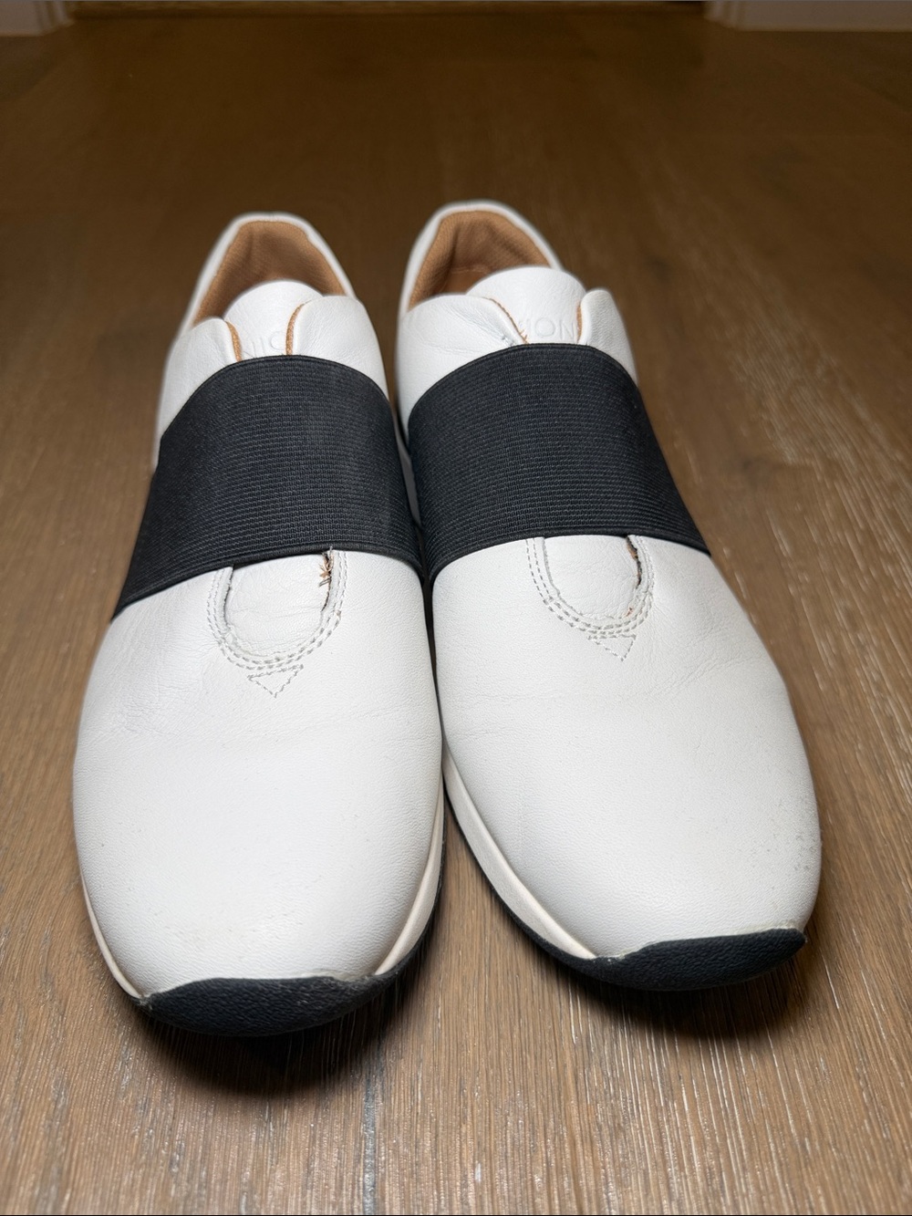 Women’s Vionic White Slip-On Loafers with Black Elastic Band